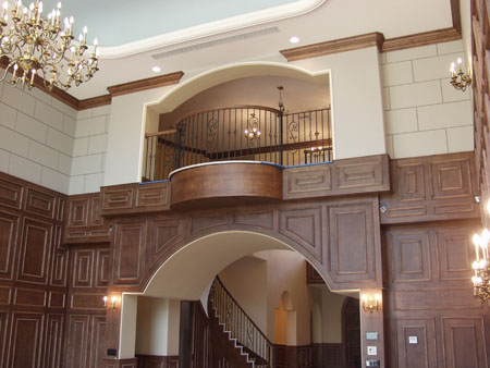 Exposed trusses with wood ceiling